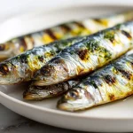 Sardinas cocinadas en freidora de aire, perfectas para una comida ligera.