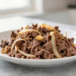 Deliciosa carne mechada cocinada en freidora de aire