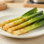 Deliciosos puerros en freidora de aire, crujientes y llenos de sabor.